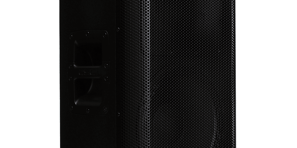 Black QSC loudspeaker with mesh front. Black QSC loudspeaker with mesh front.